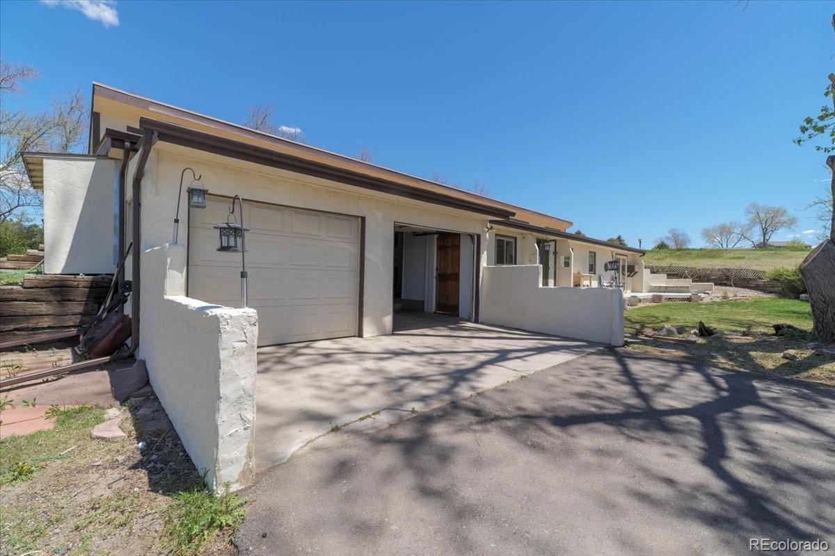 2283 Haskell Way Watkins, CO 80137 - Photo 3 of 36 a backyard of a house