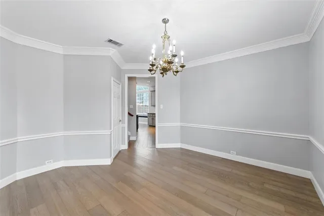 a view of a livingroom with wooden floor