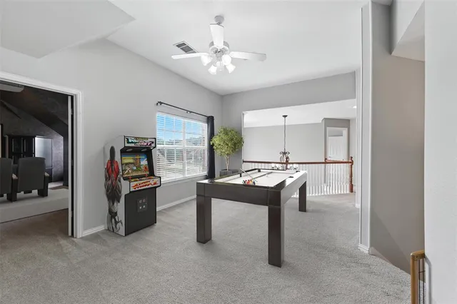 a living room with furniture and window