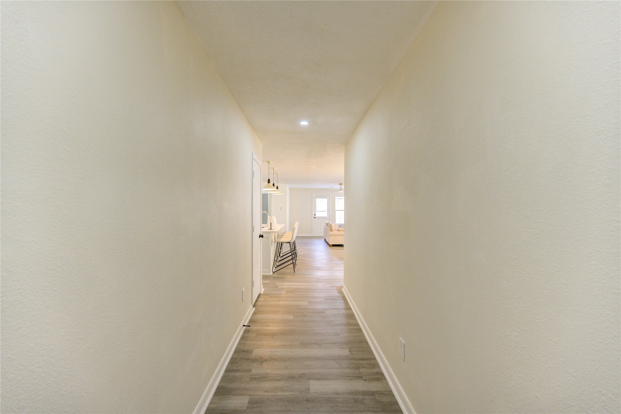 1010 Hummingbird Point Lane Houston, TX 77090 - Photo 6 of 50 a view of a hallway with a white walls