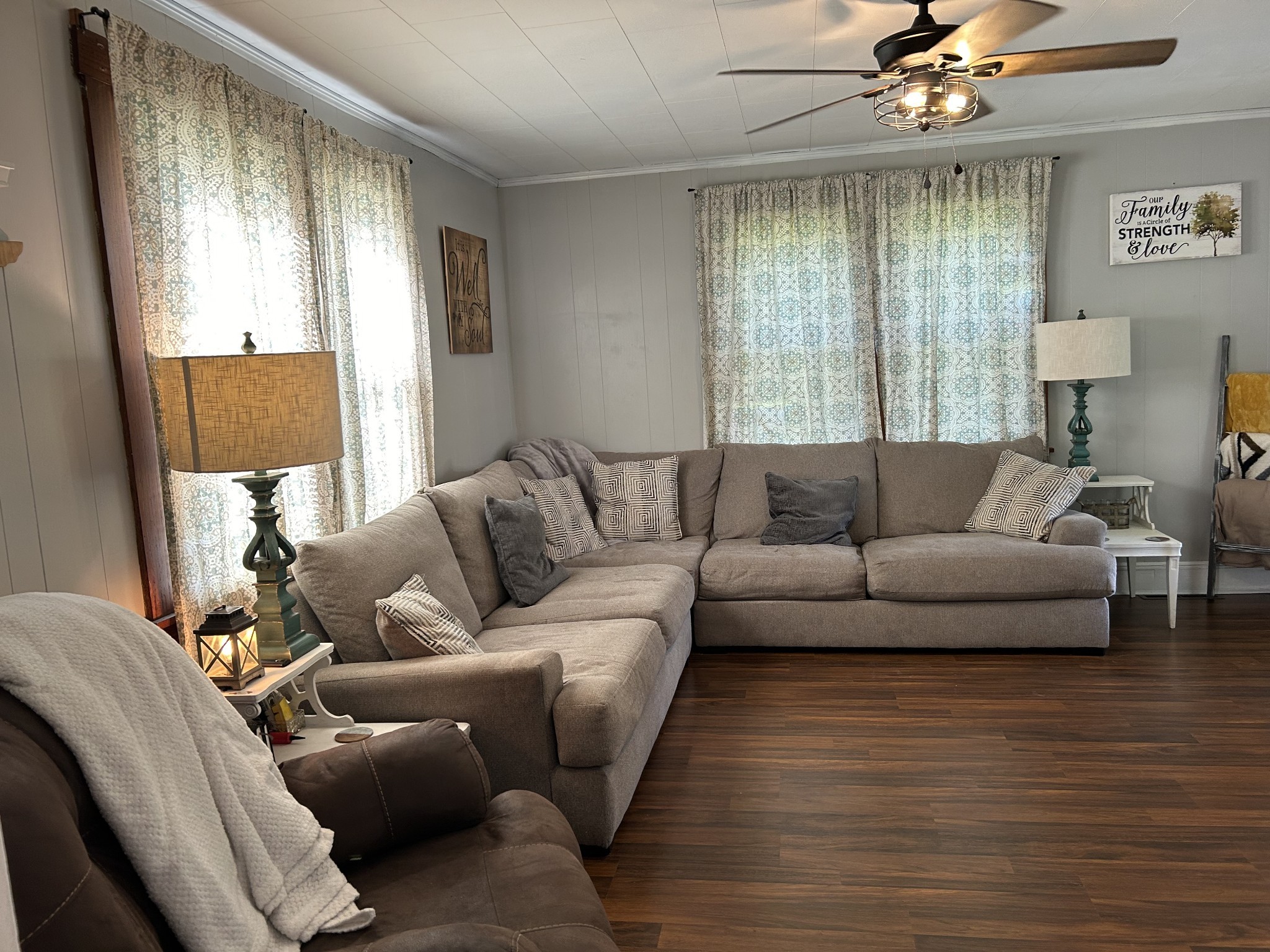 110 East Main Street Loretto, TN 38469 - Photo 3 of 10 a living room with furniture and a large window