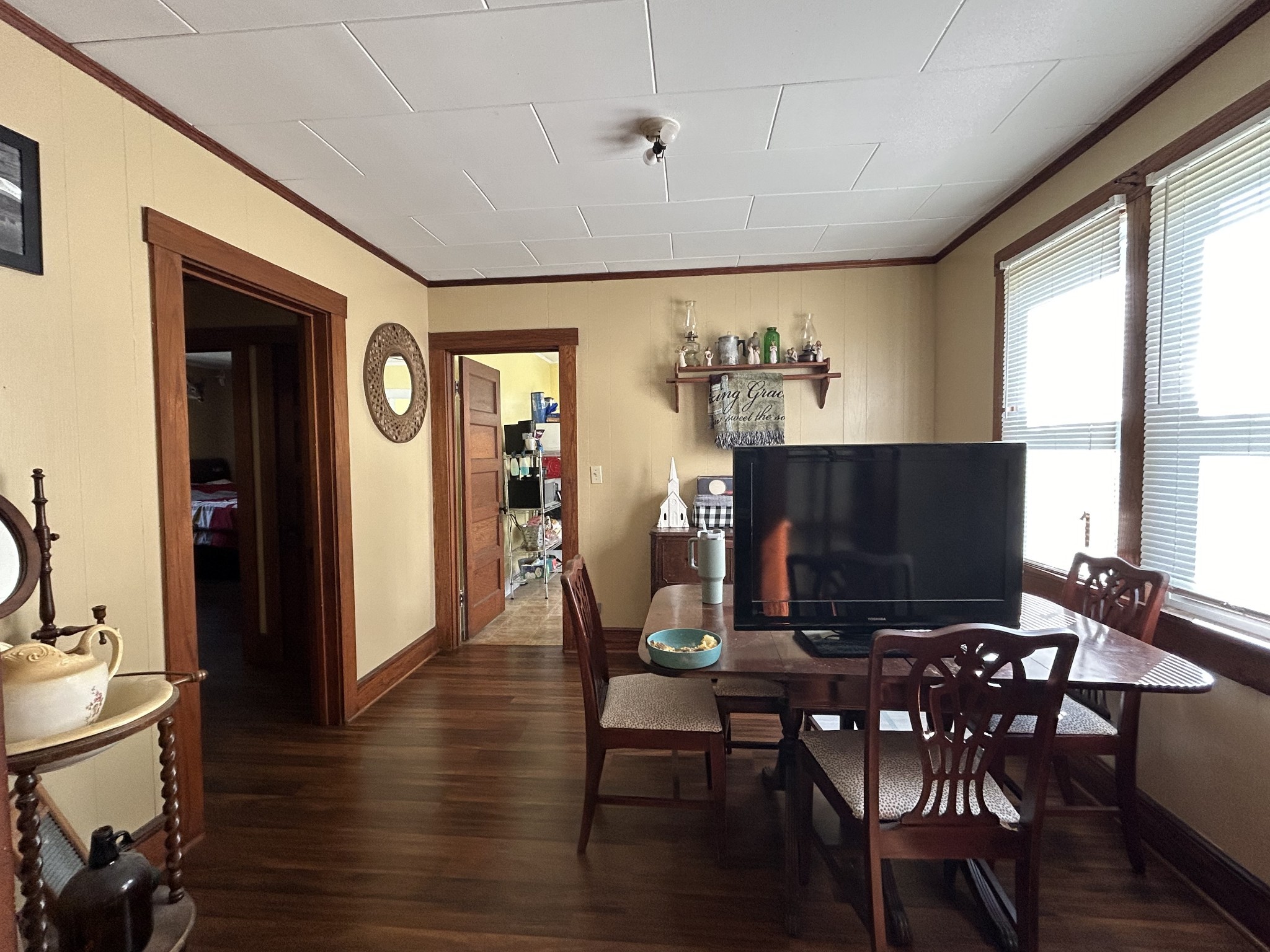 110 East Main Street Loretto, TN 38469 - Photo 4 of 10 a view of a livingroom with furniture window and wooden floor
