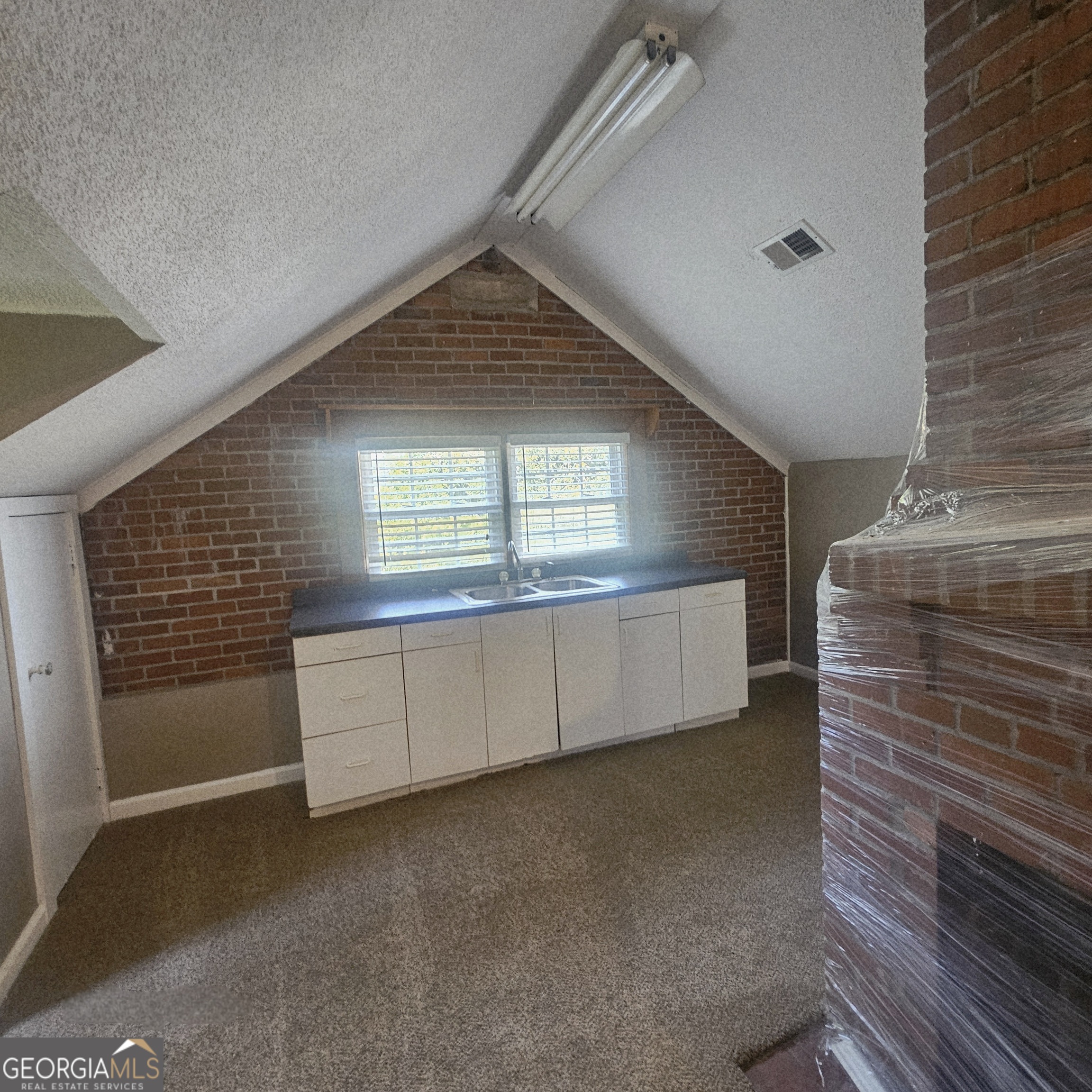 107 East Liberty Street Claxton, GA 30417 - Photo 12 of 29 a view of a garage