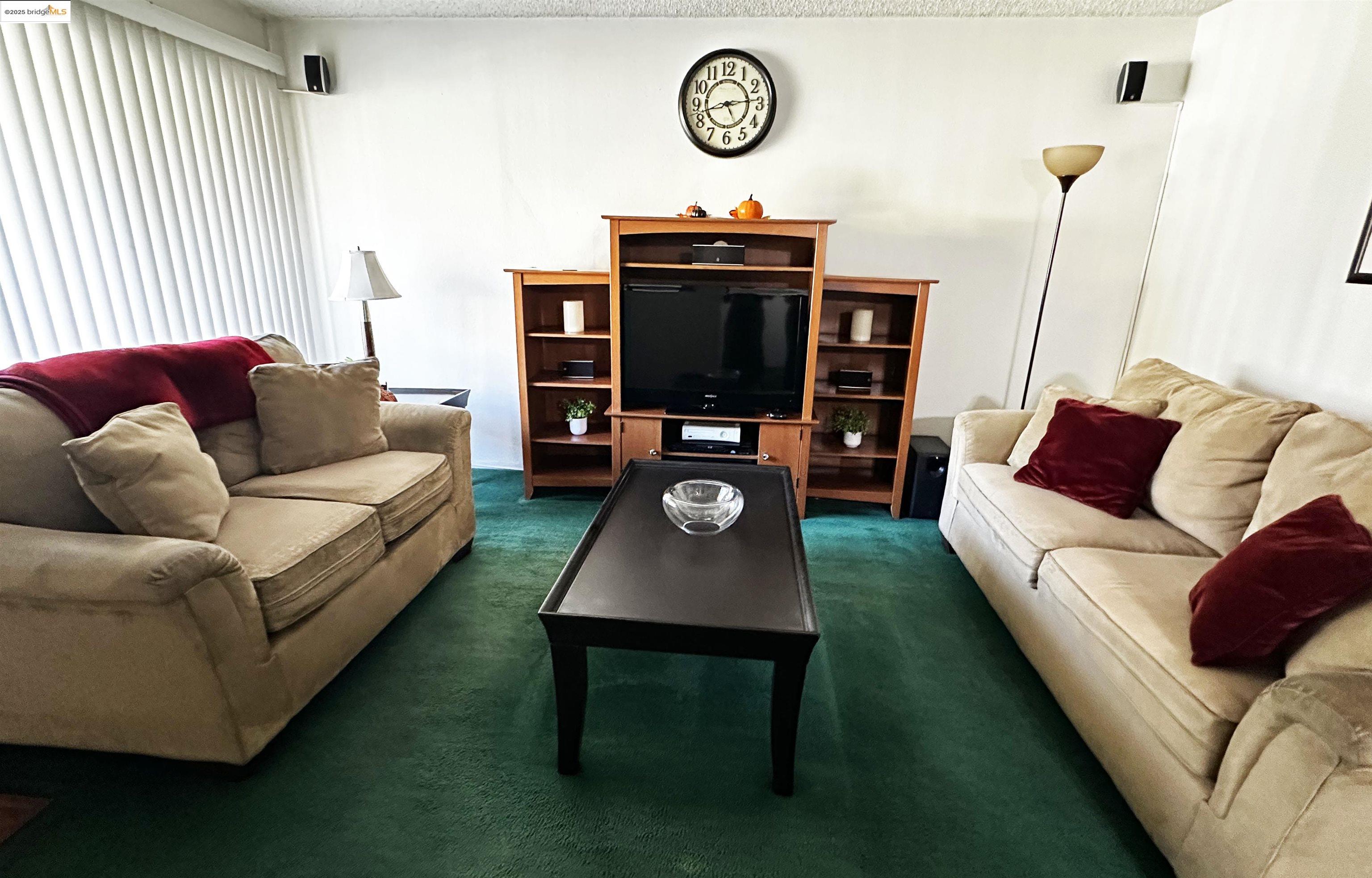 13305 Meyer Road, Unit B Whittier, CA 90605 - Photo 7 of 17 a living room with furniture and a flat screen tv