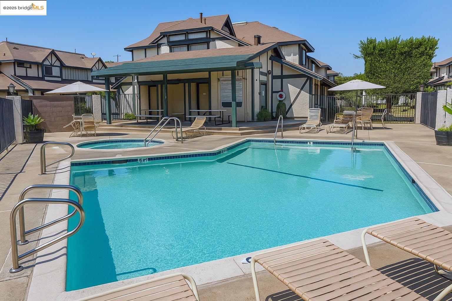13305 Meyer Road, Unit B Whittier, CA 90605 - Photo 10 of 17 a view of a building with a swimming pool