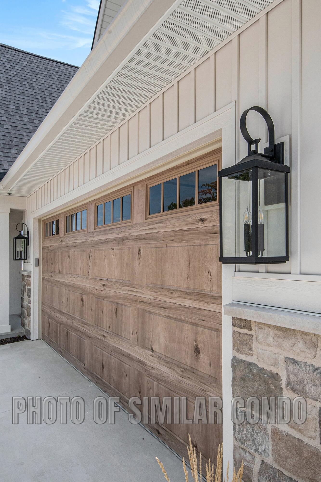 3406 Ravinewood Court, Unit 23 Jenison, MI 49428 - Photo 4 of 38 Gables Model #31 Exterior Garage Similar