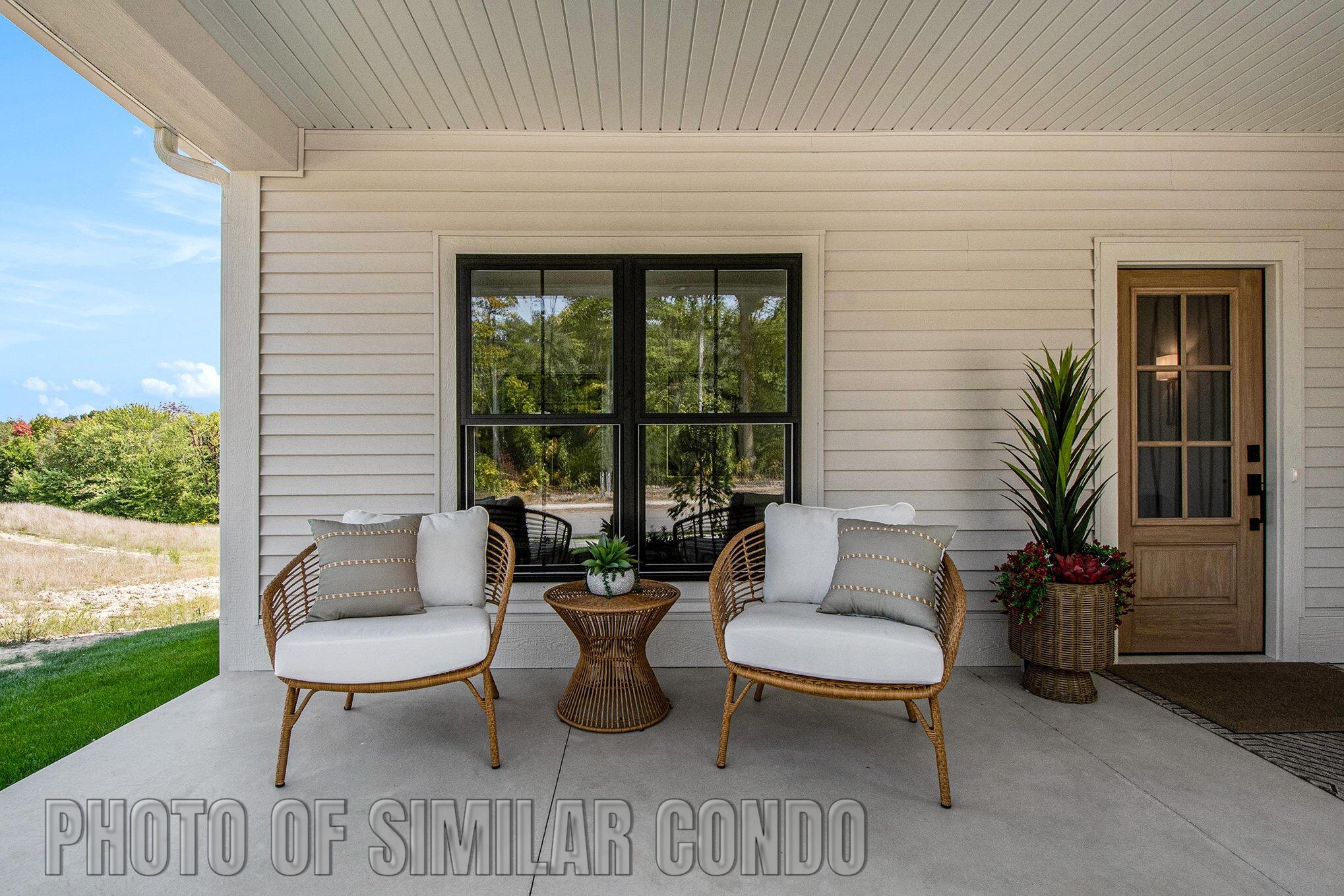 3406 Ravinewood Court, Unit 23 Jenison, MI 49428 - Photo 5 of 38 Gables Model #31 Exterior Porch Similar