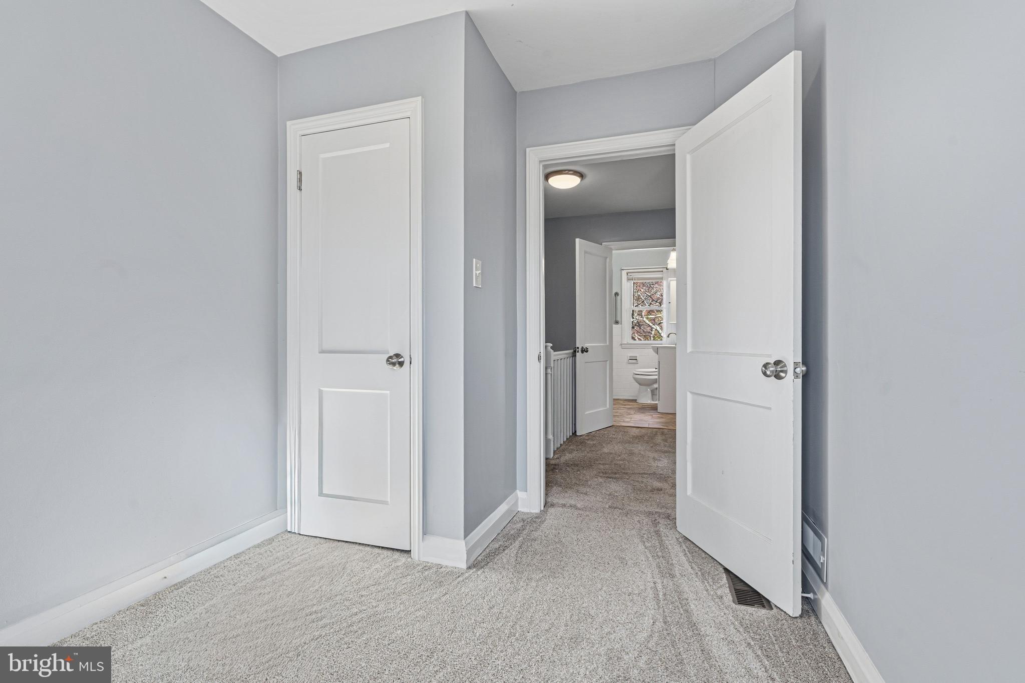 5127 Terrace Drive Nottingham, MD 21236 - Photo 13 of 33 wooden floor with white walls
