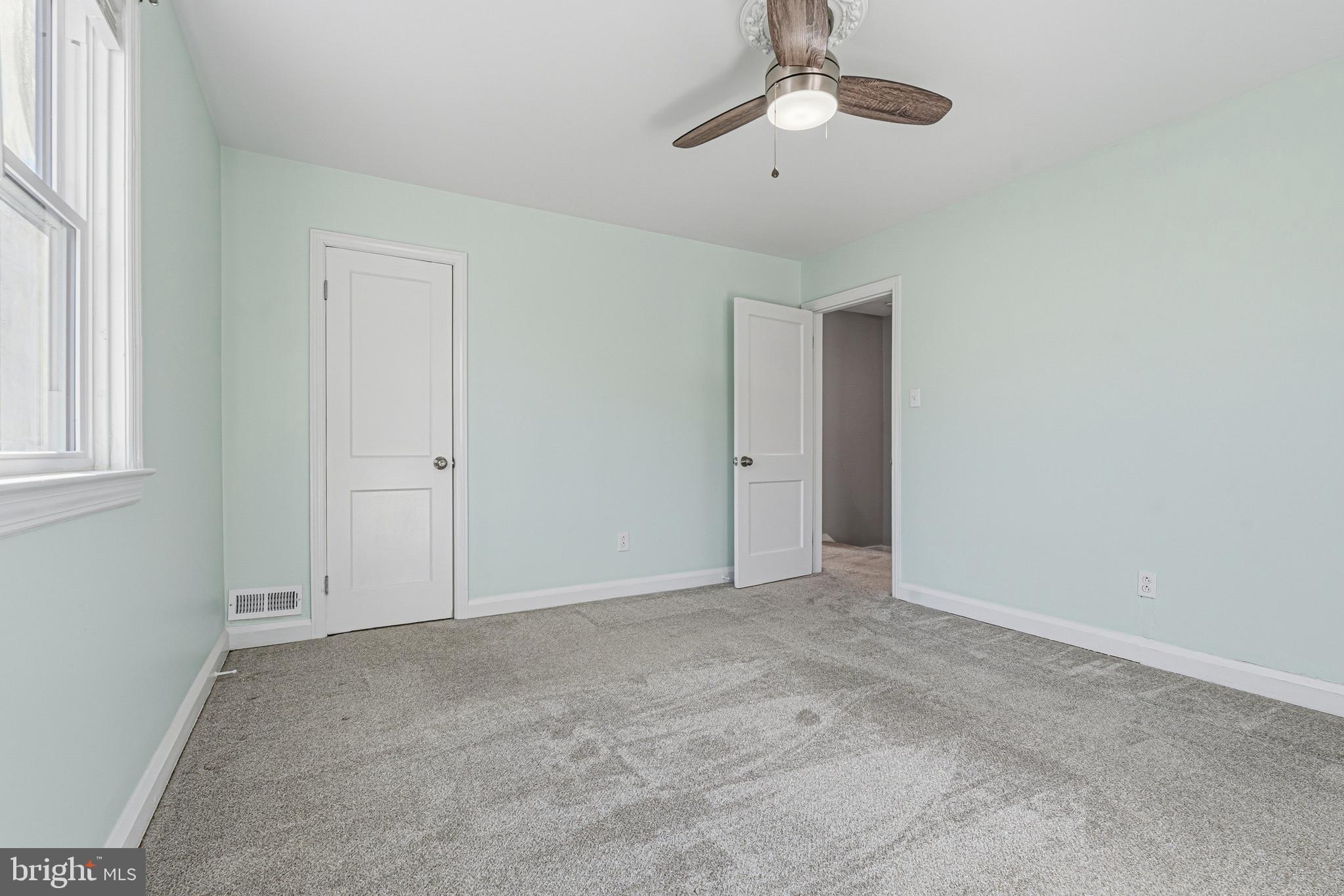 5127 Terrace Drive Nottingham, MD 21236 - Photo 17 of 33 an empty room with chandelier fan