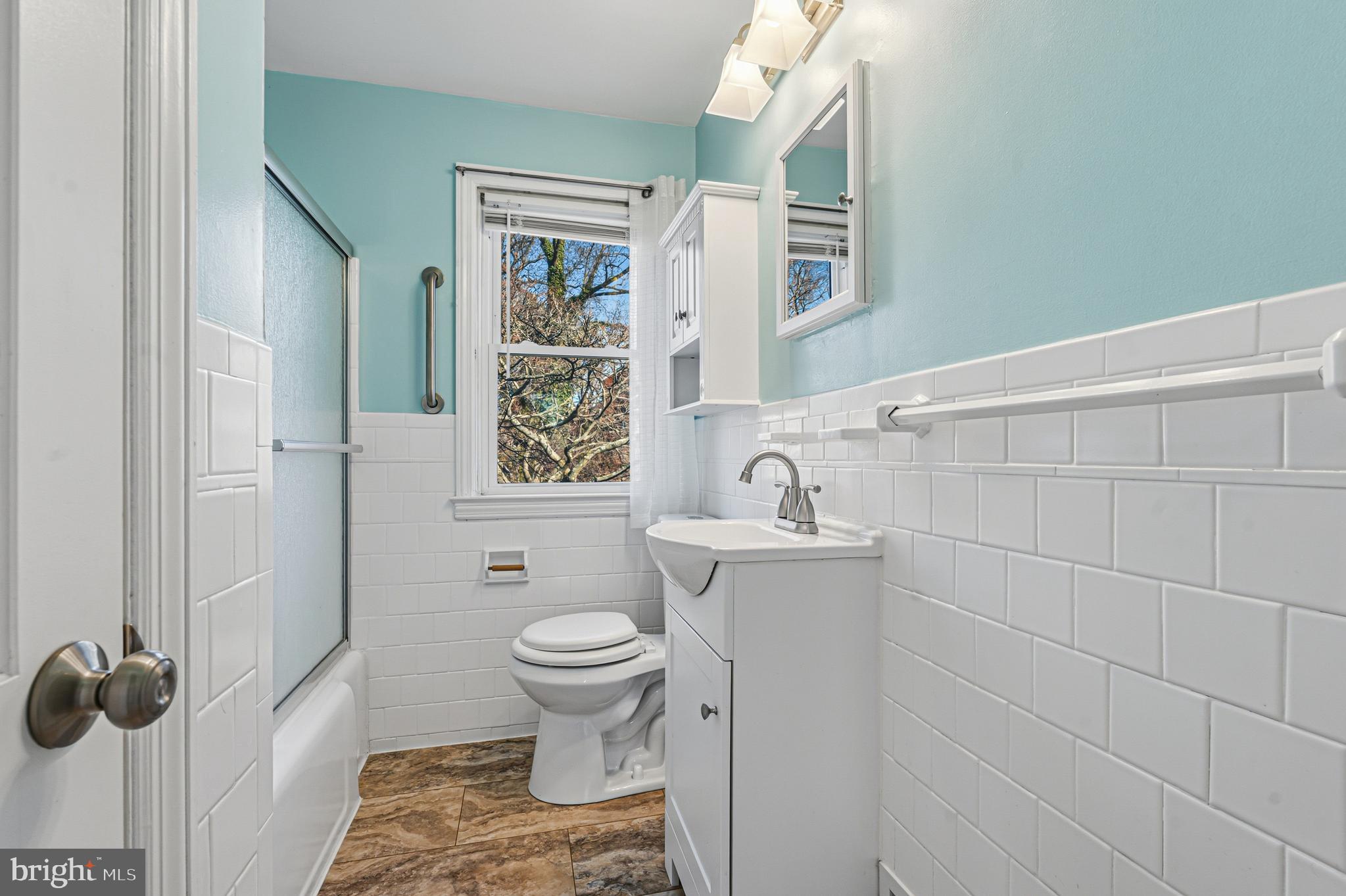 5127 Terrace Drive Nottingham, MD 21236 - Photo 18 of 33 a bathroom with a sink toilet and shower
