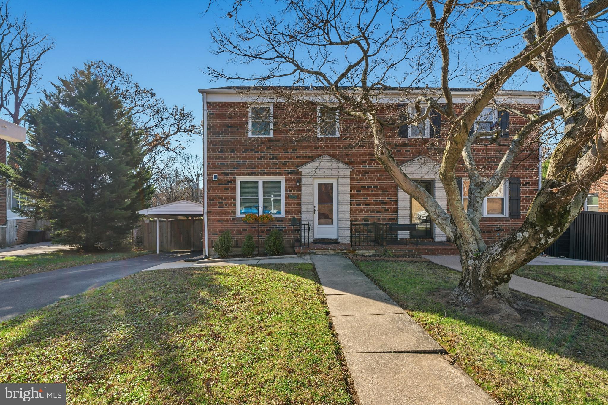 5127 Terrace Drive Nottingham, MD 21236 - Photo 2 of 33 a front view of a house with a yard and garage