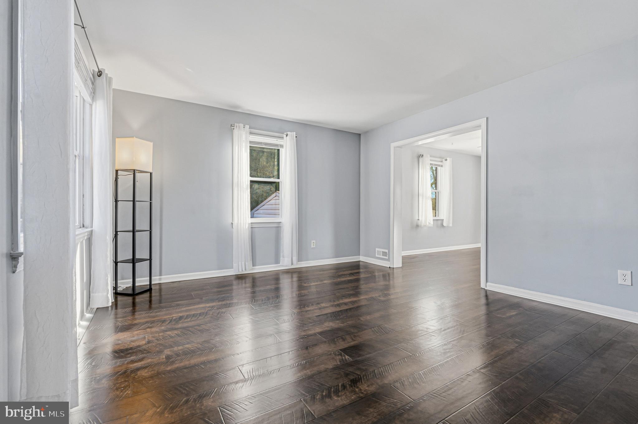 5127 Terrace Drive Nottingham, MD 21236 - Photo 3 of 33 an empty room with wooden floor and windows