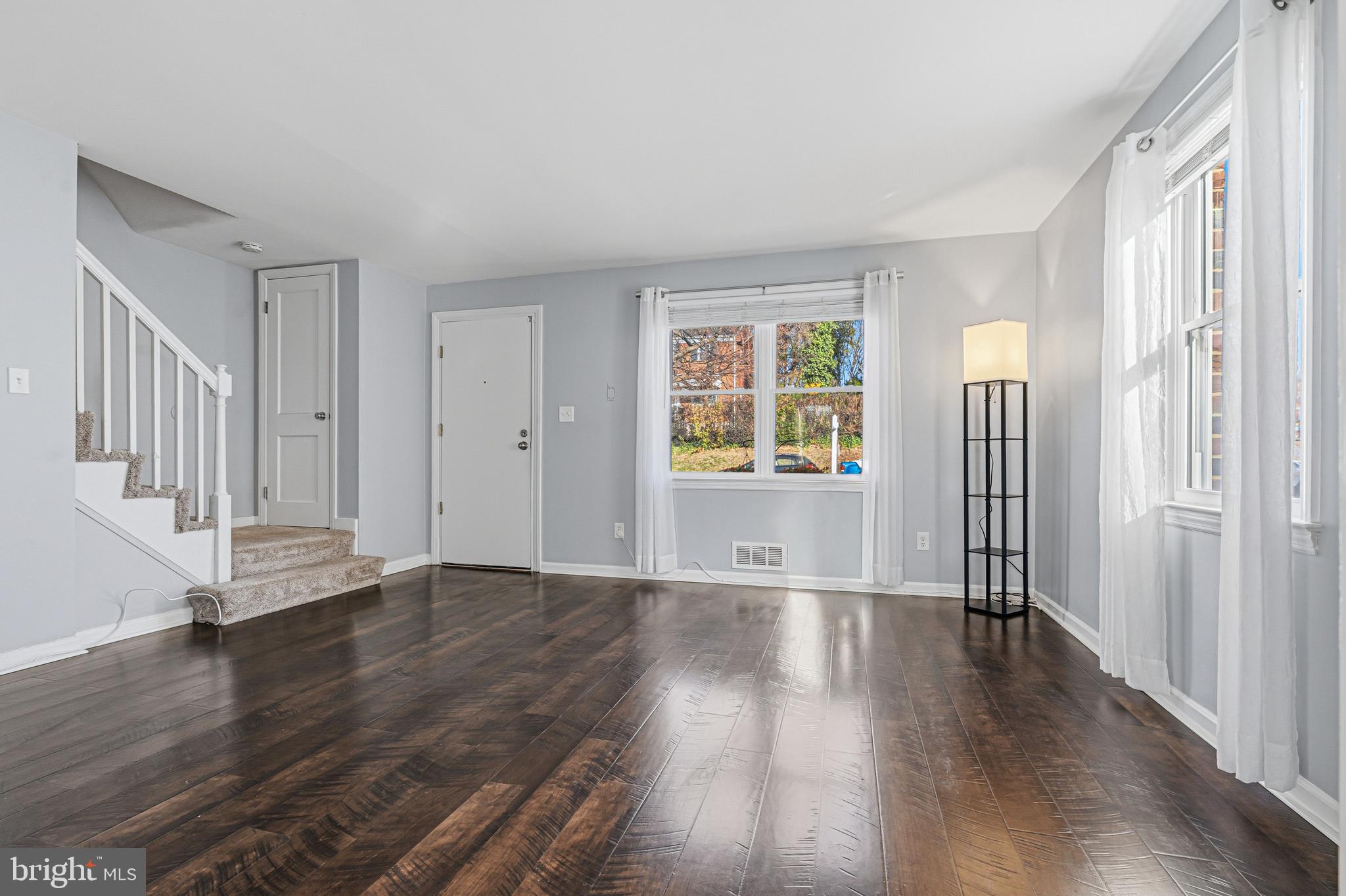 5127 Terrace Drive Nottingham, MD 21236 - Photo 4 of 33 an empty room with wooden floor and windows