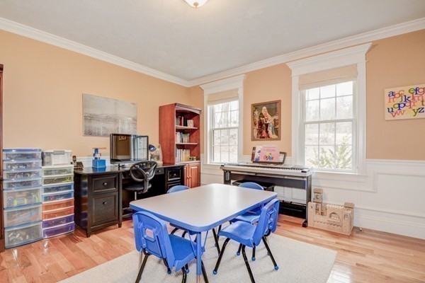 45 Putnam Hill Road Sutton, MA 01590 - Photo 12 of 30 a kitchen with a stove a table and chairs in it
