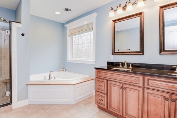 45 Putnam Hill Road Sutton, MA 01590 - Photo 16 of 30 a bathroom with a sink and a bathtub