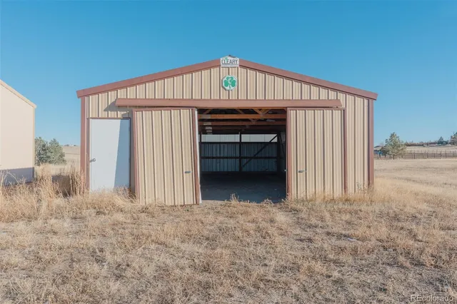 a view of a room with wooden roof