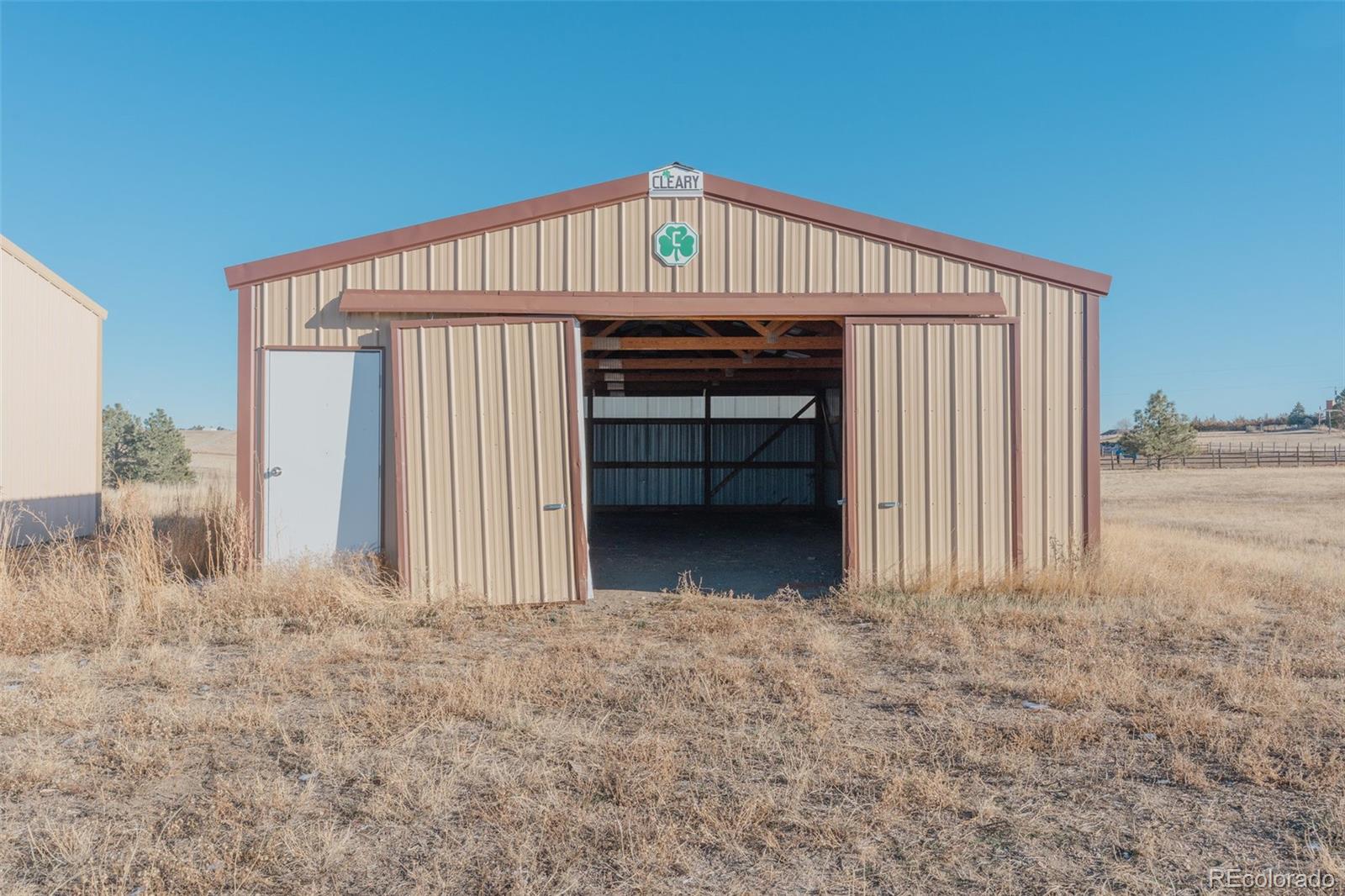 45922 Summit Road Parker, CO 80138 - Photo 19 of 35 a view of a house with a balcony