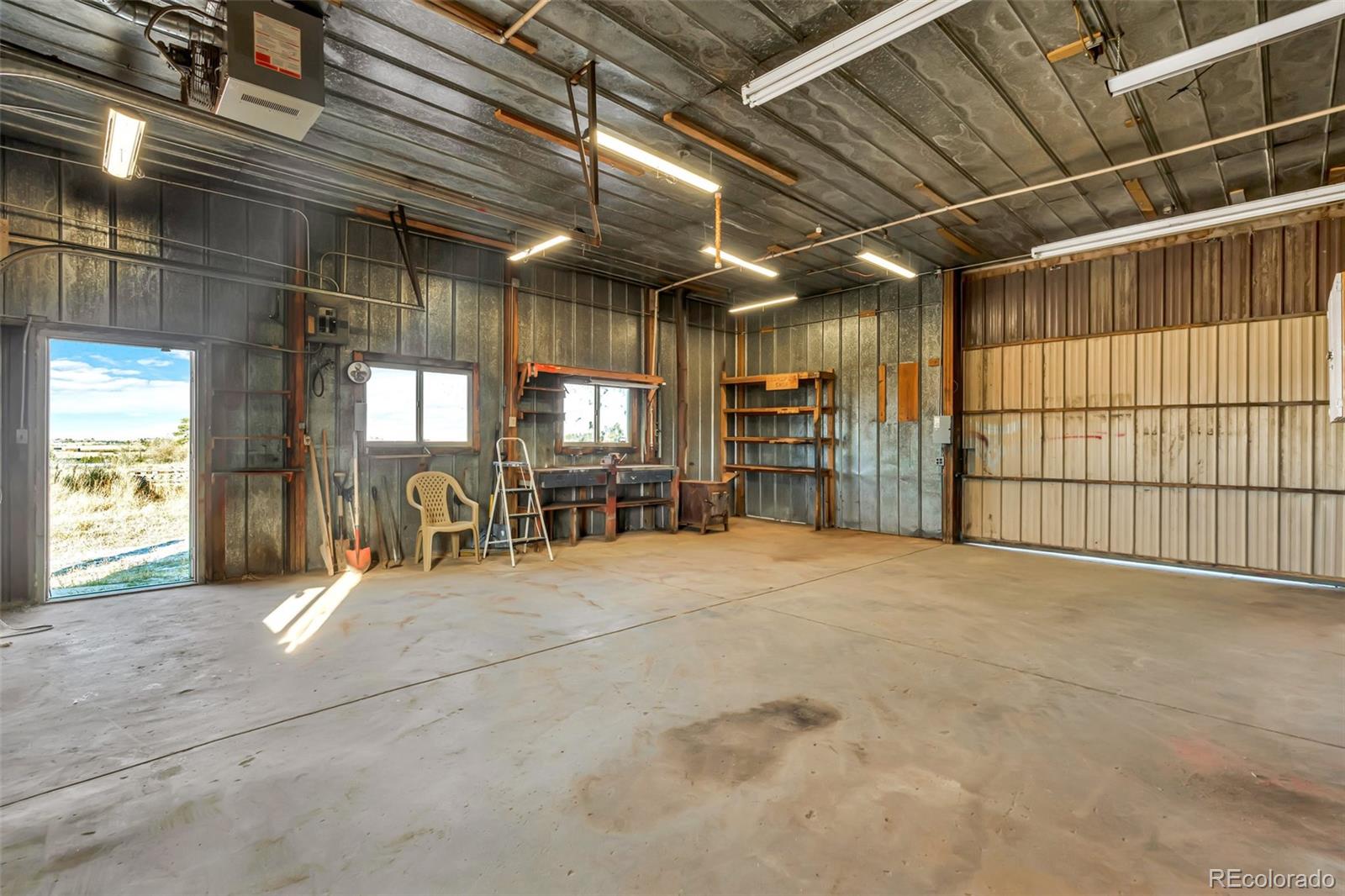 45922 Summit Road Parker, CO 80138 - Photo 22 of 35 a view of an empty room with a fireplace