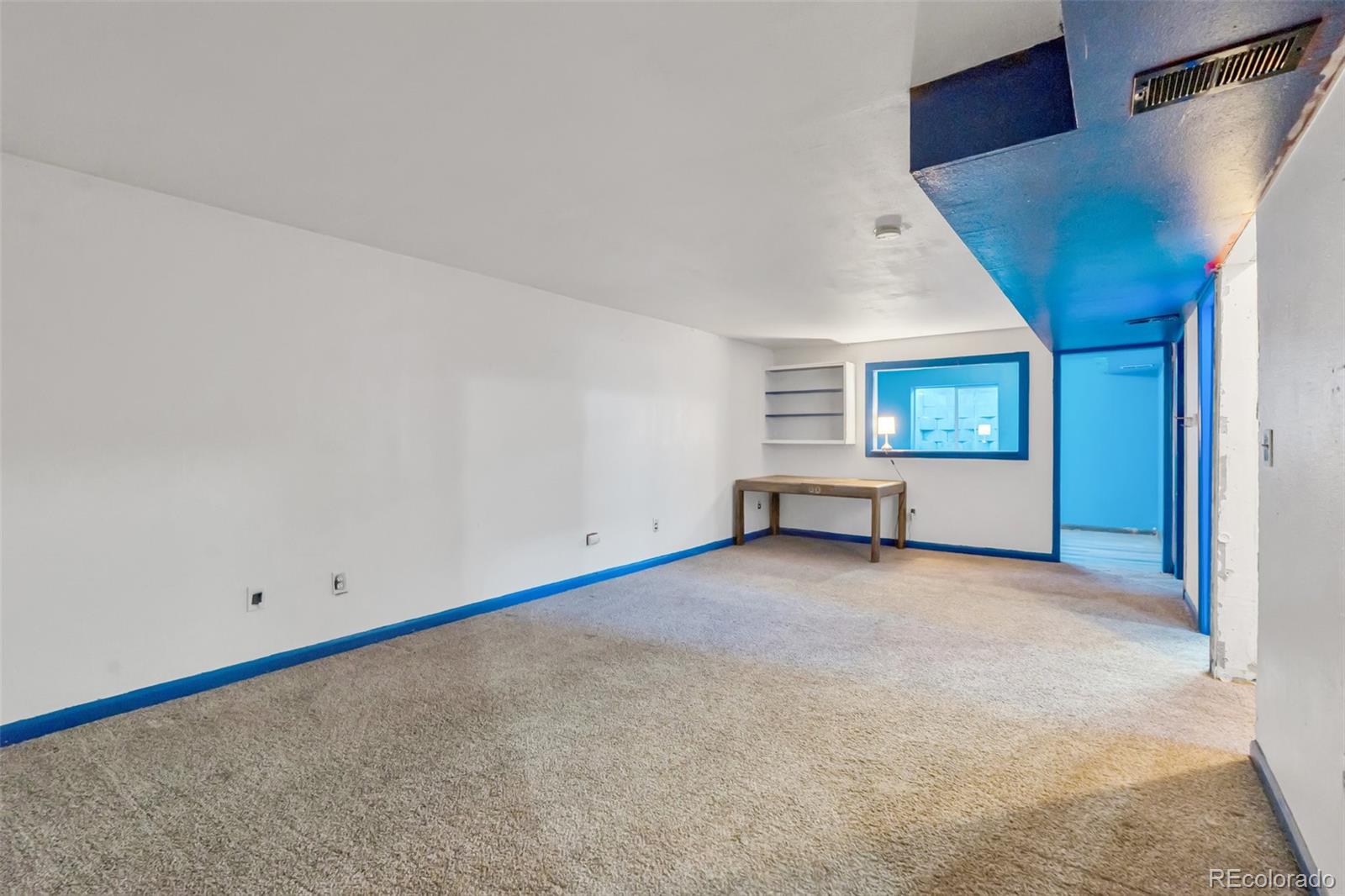 45922 Summit Road Parker, CO 80138 - Photo 31 of 35 an empty room with windows and entrance