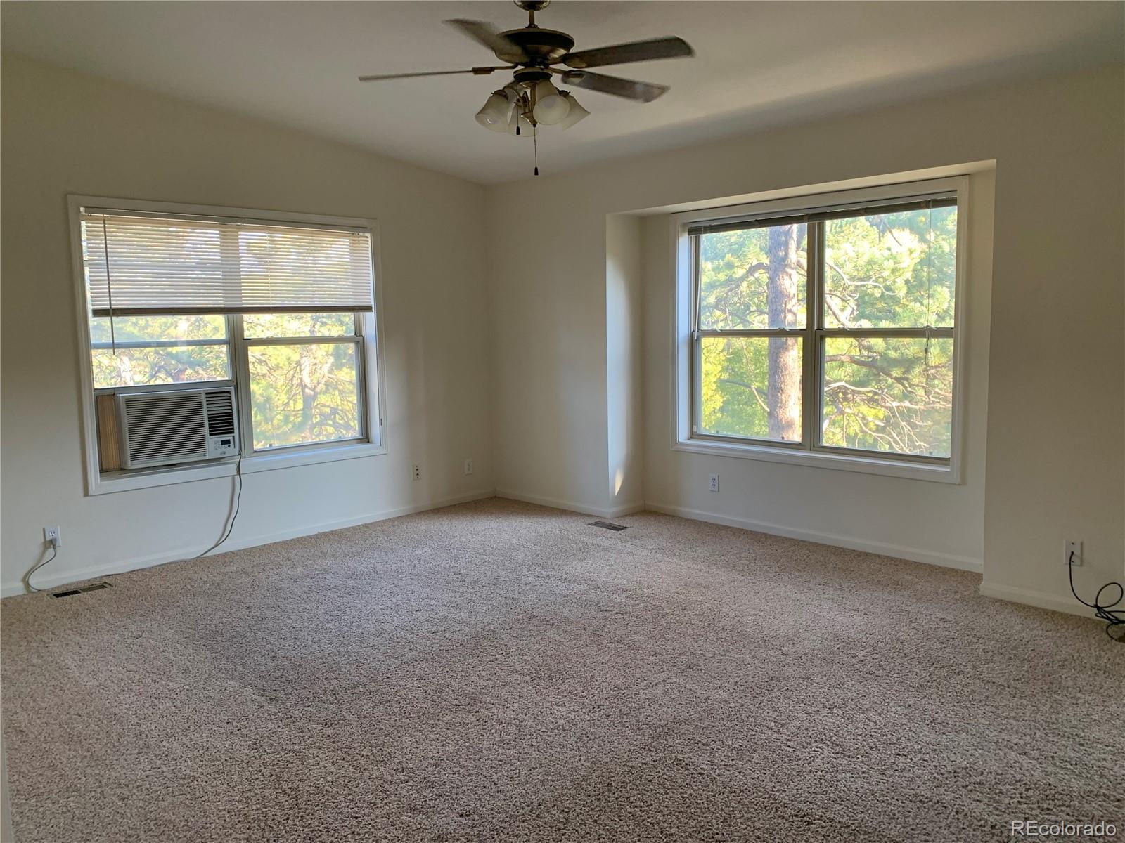 201 Bluebird Drive Bailey, CO 80421 - Photo 12 of 45 a view of an empty room with a window
