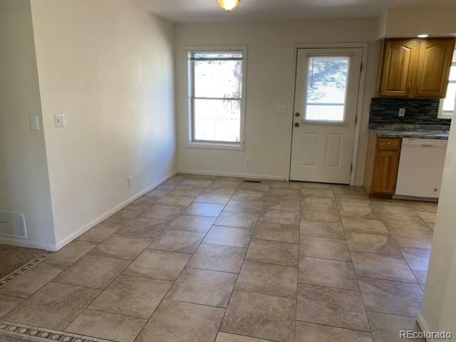 201 Bluebird Drive Bailey, CO 80421 - Photo 13 of 45 a view of kitchen with granite countertop cabinets and window