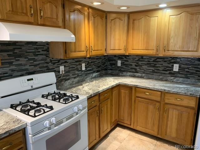 201 Bluebird Drive Bailey, CO 80421 - Photo 20 of 45 a kitchen with a stove and a sink