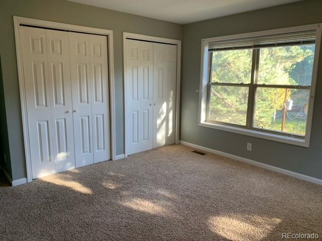 201 Bluebird Drive Bailey, CO 80421 - Photo 24 of 45 a view of an empty room with a window