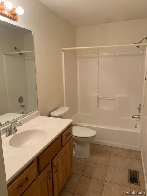 201 Bluebird Drive Bailey, CO 80421 - Photo 27 of 45 a bathroom with a sink a toilet and shower