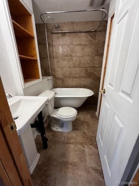 201 Bluebird Drive Bailey, CO 80421 - Photo 33 of 45 a bathroom with a shower and a toilet