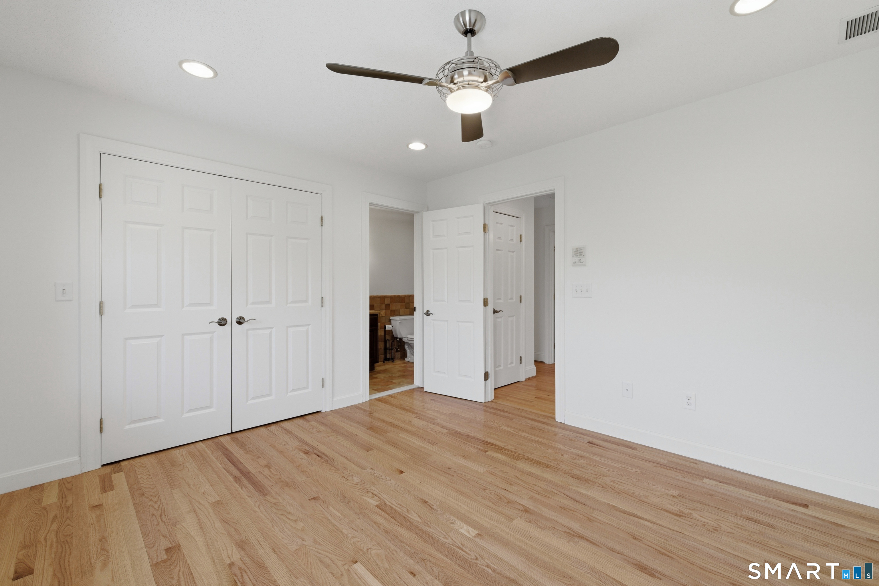7 Mountainside Road West Hartford, CT 06117 - Photo 27 of 40 a view of an empty room with a ceiling fan
