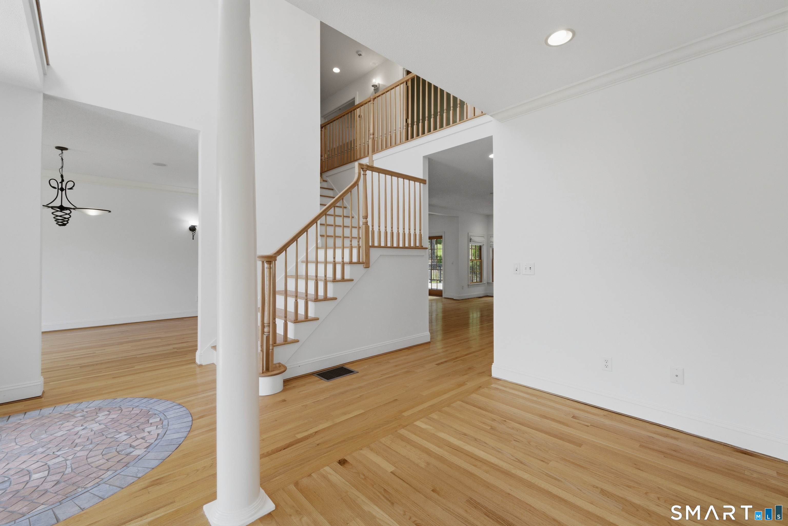 7 Mountainside Road West Hartford, CT 06117 - Photo 6 of 40 a view of entryway with wooden floor