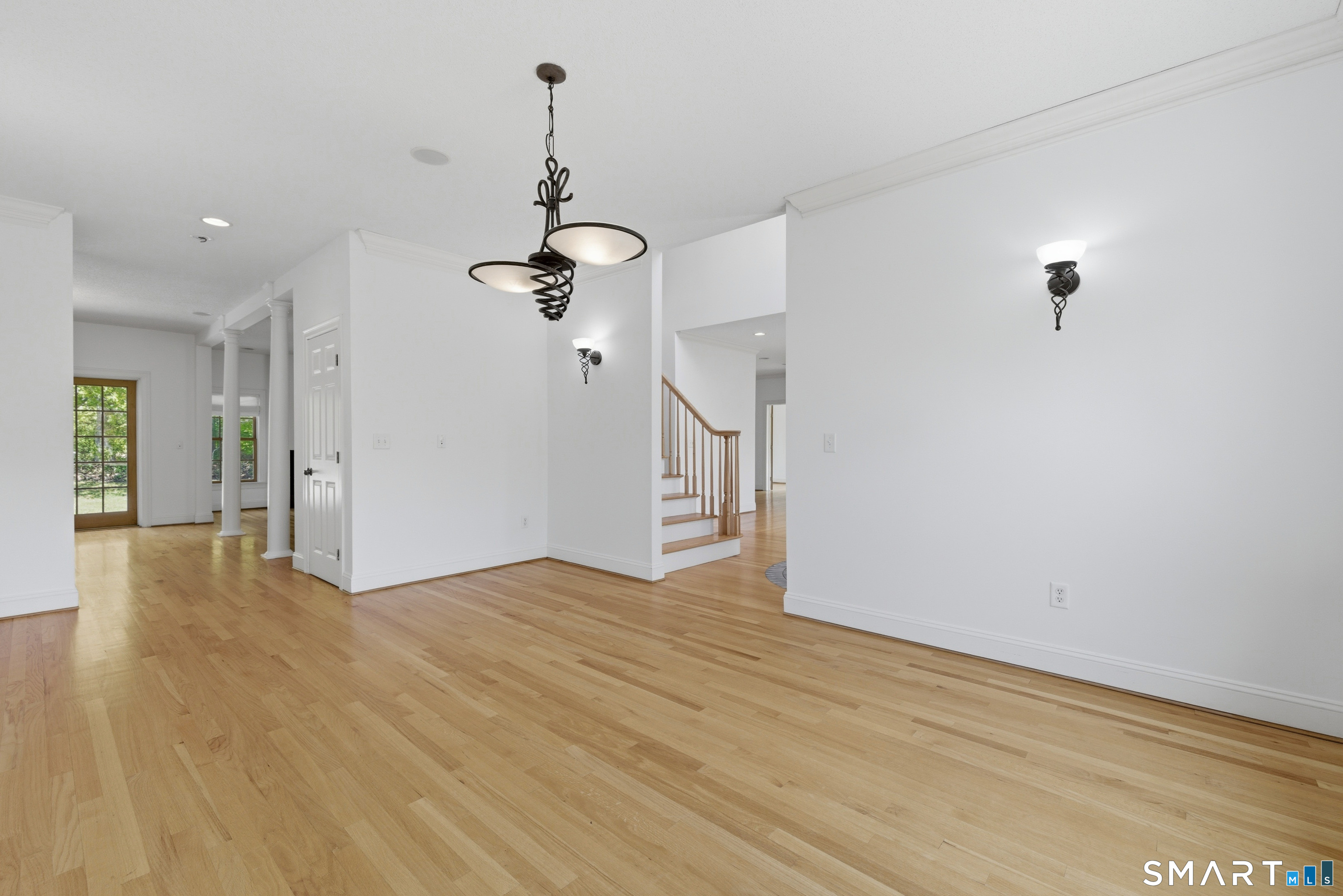 7 Mountainside Road West Hartford, CT 06117 - Photo 9 of 40 a view of empty room with wooden floor