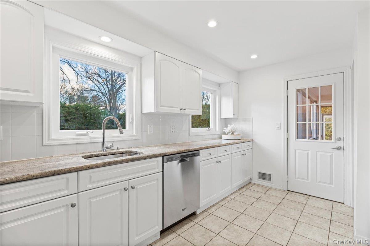 22 Old Orchard Road Rye Brook, NY 10573 - Photo 13 of 30 Large window above sink overlooking the private back yard