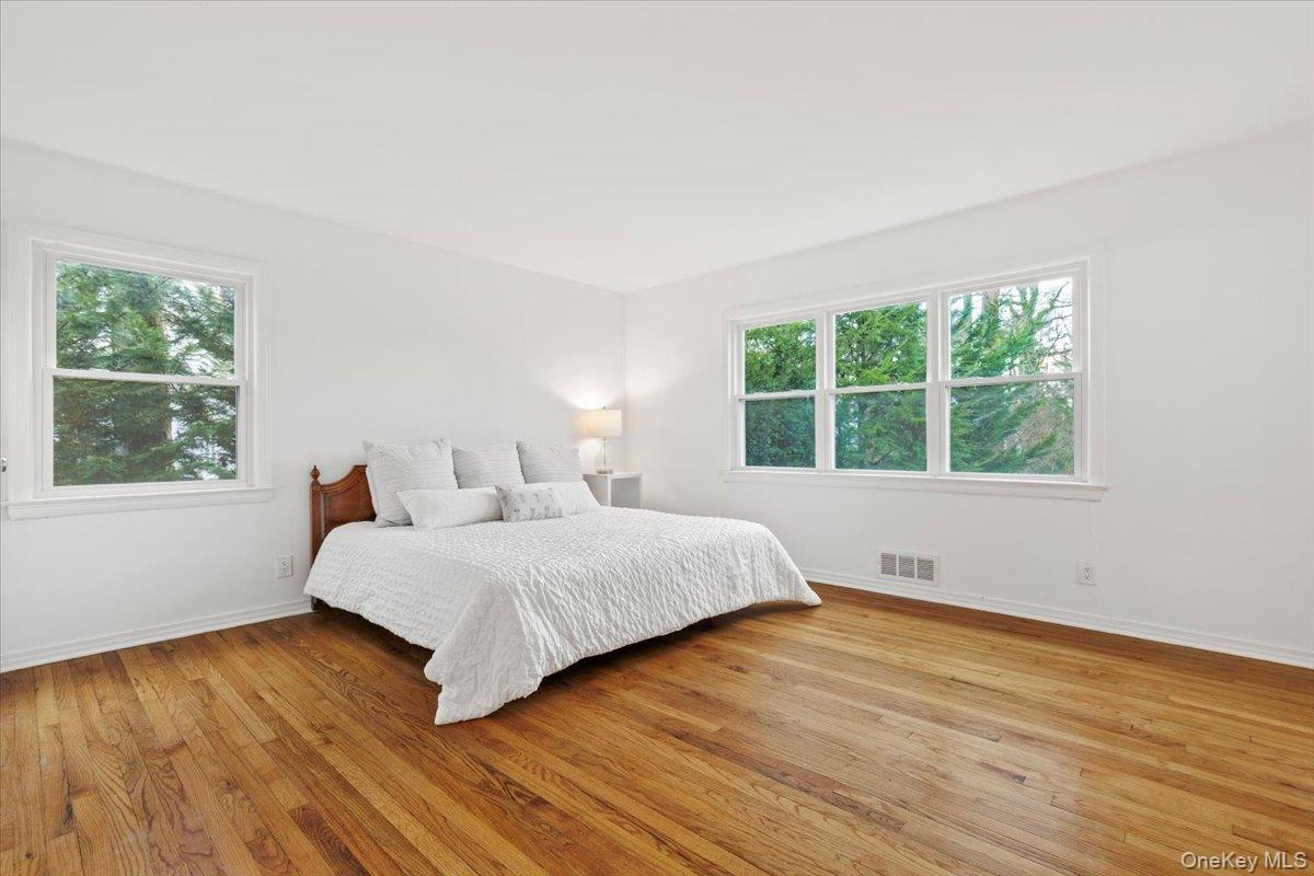 22 Old Orchard Road Rye Brook, NY 10573 - Photo 14 of 30 Primary bedroom features double closet with custom built-ins and full bath