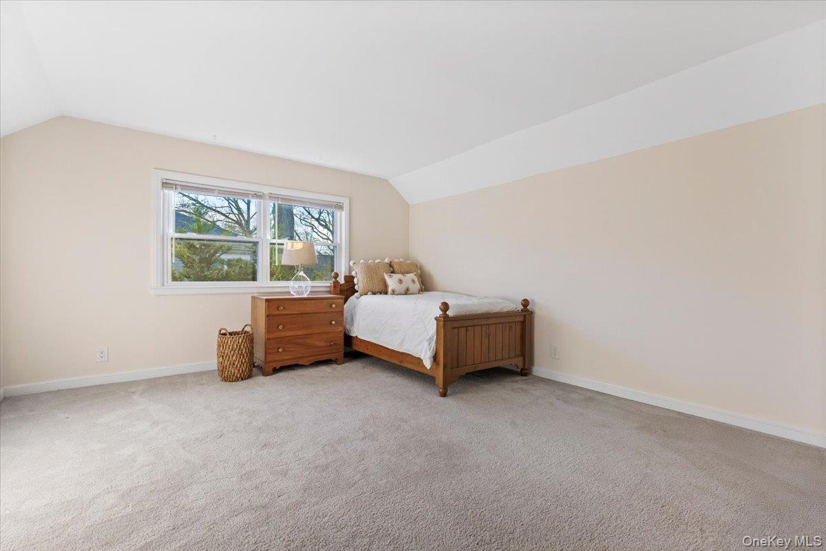22 Old Orchard Road Rye Brook, NY 10573 - Photo 22 of 30 LARGE second floor bedroom with lofted tray ceiling.