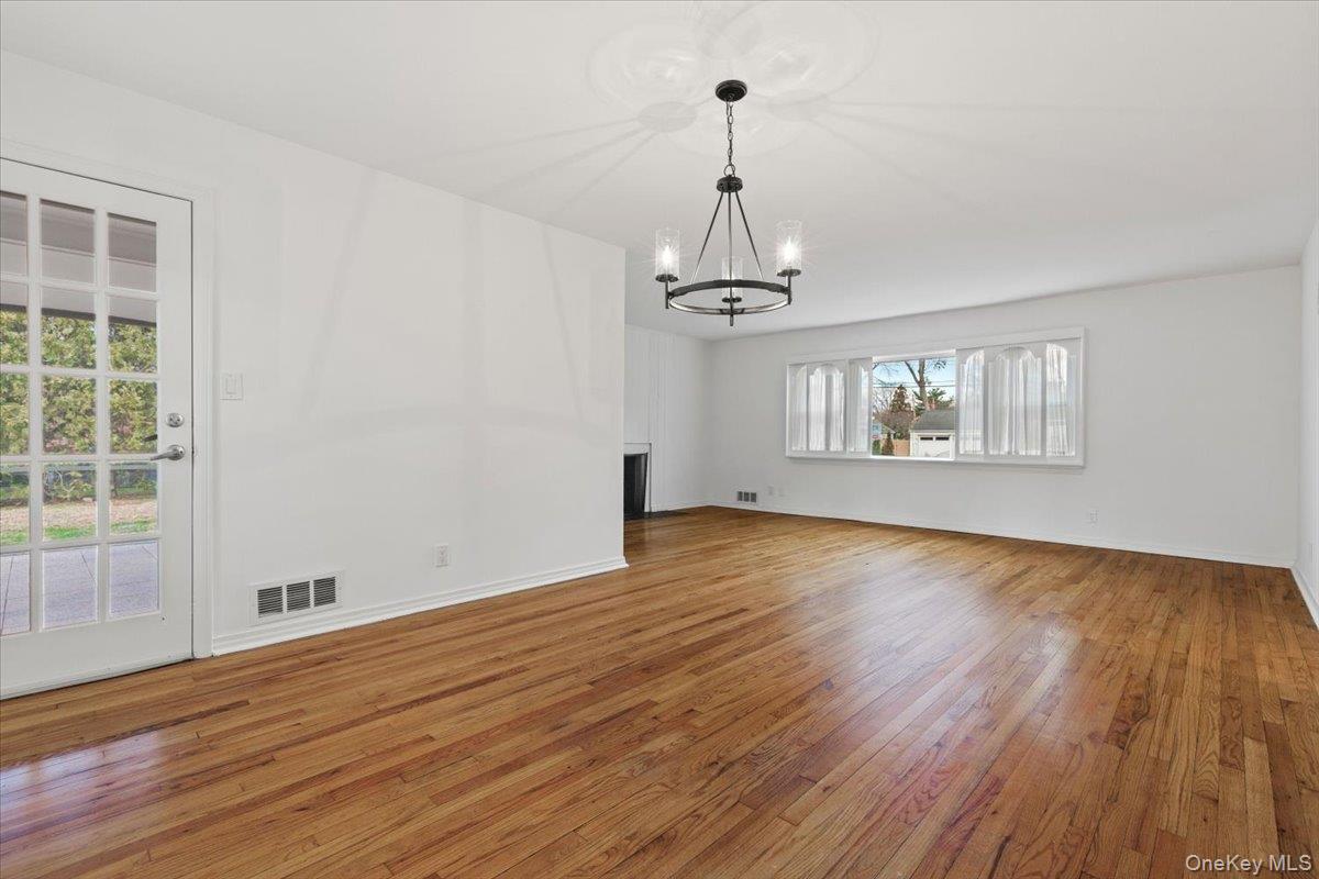 22 Old Orchard Road Rye Brook, NY 10573 - Photo 6 of 30 DR allows for large table seating w/ french door leading to rear yard screened in porch