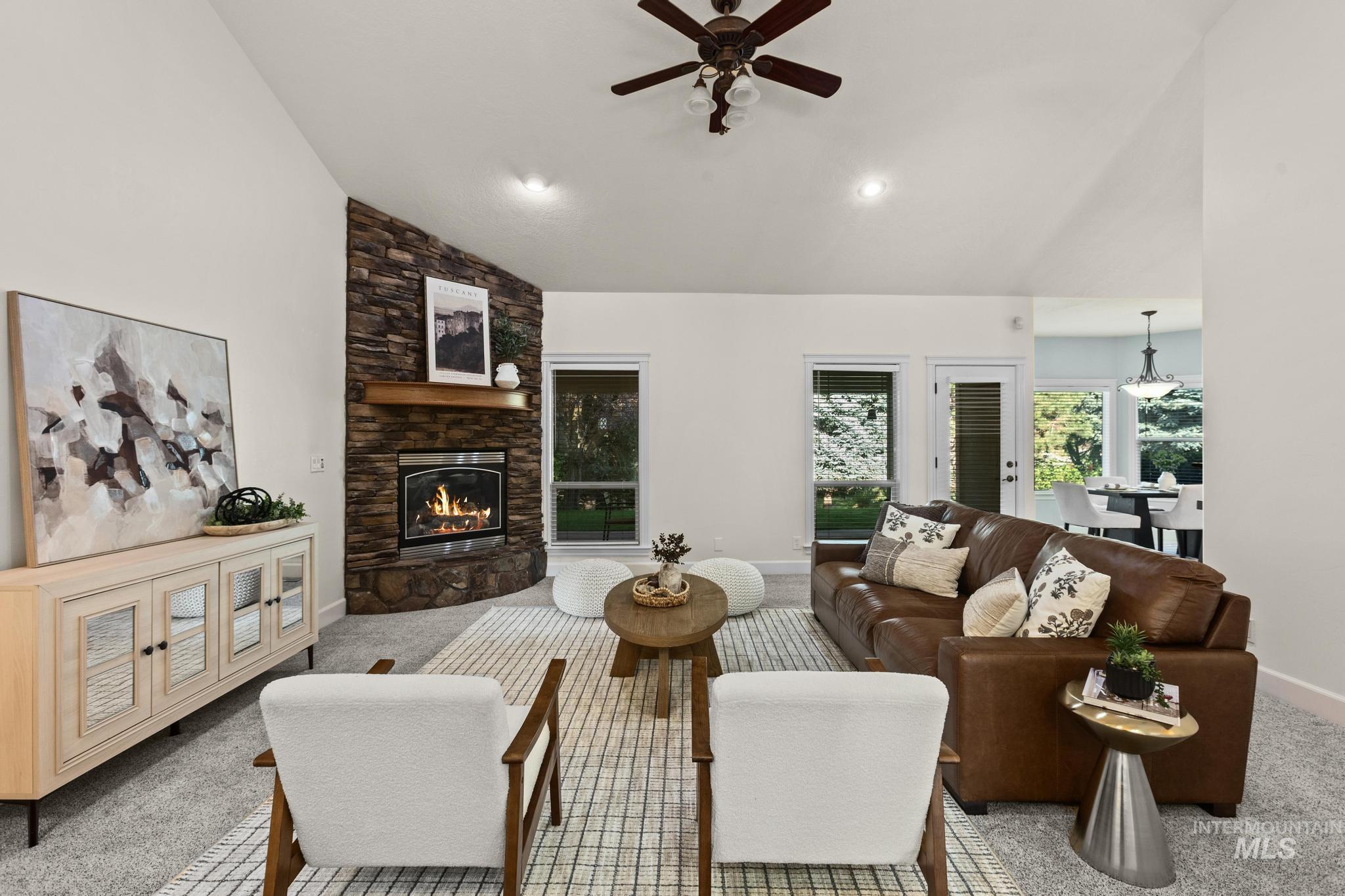 4946 North Villa Ridge Way Boise, ID 83703 - Photo 5 of 49 Spacious living area featuring a vaulted ceiling and recessed lighting