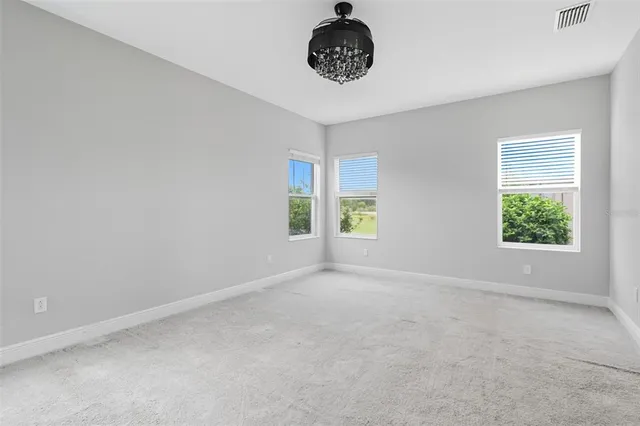 a bathroom with a shower sink and mirror