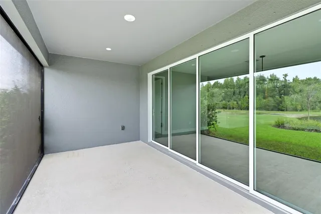 a view of house with outdoor space and lake view