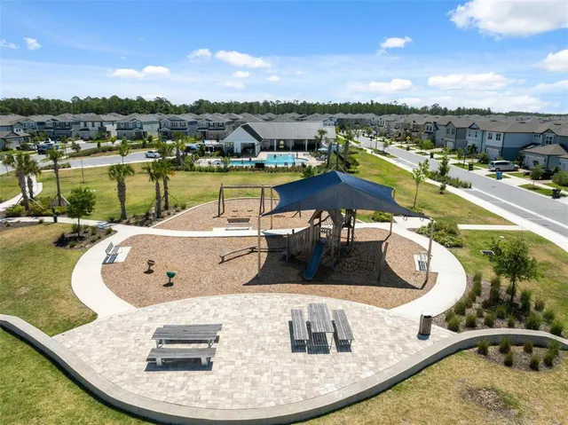 an aerial view of a house with a garden