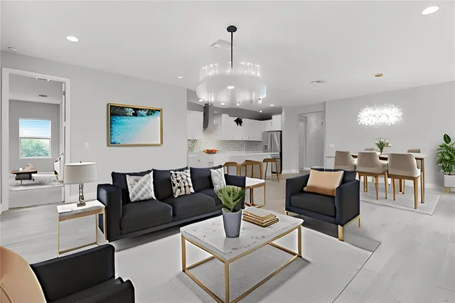 a view of a workspace with furniture and a potted plant