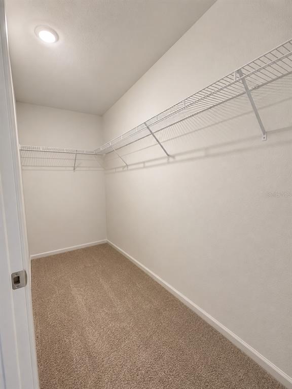 339 Redbud Road Palm Coast, FL 32137 - Photo 20 of 22 a view of a room with racks on the wall