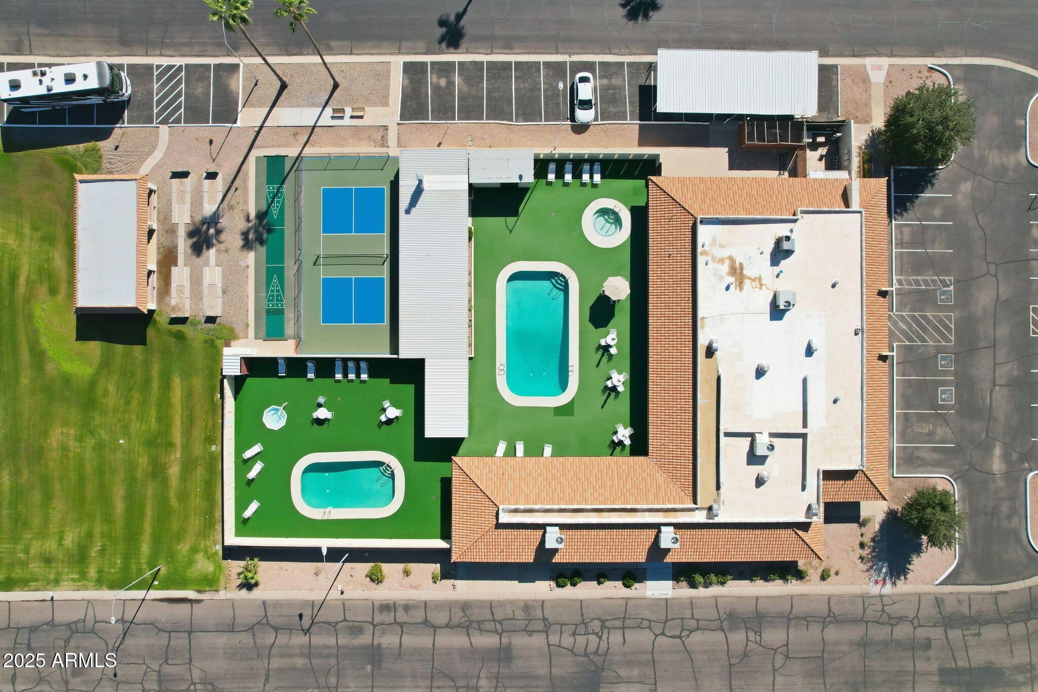 2100 North Trekell Road, Unit 204 Casa Grande, AZ 85122 - Photo 2 of 27 an aerial view of a house with a yard