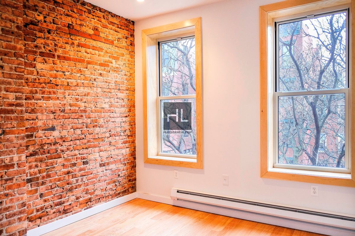 43 Cumberland Street, Unit UNT THREE Brooklyn, NY 11205 - Photo 6 of 9 a front door with a vanity and a window
