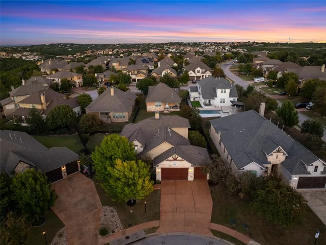 an aerial view of a city with lots of residential buildings