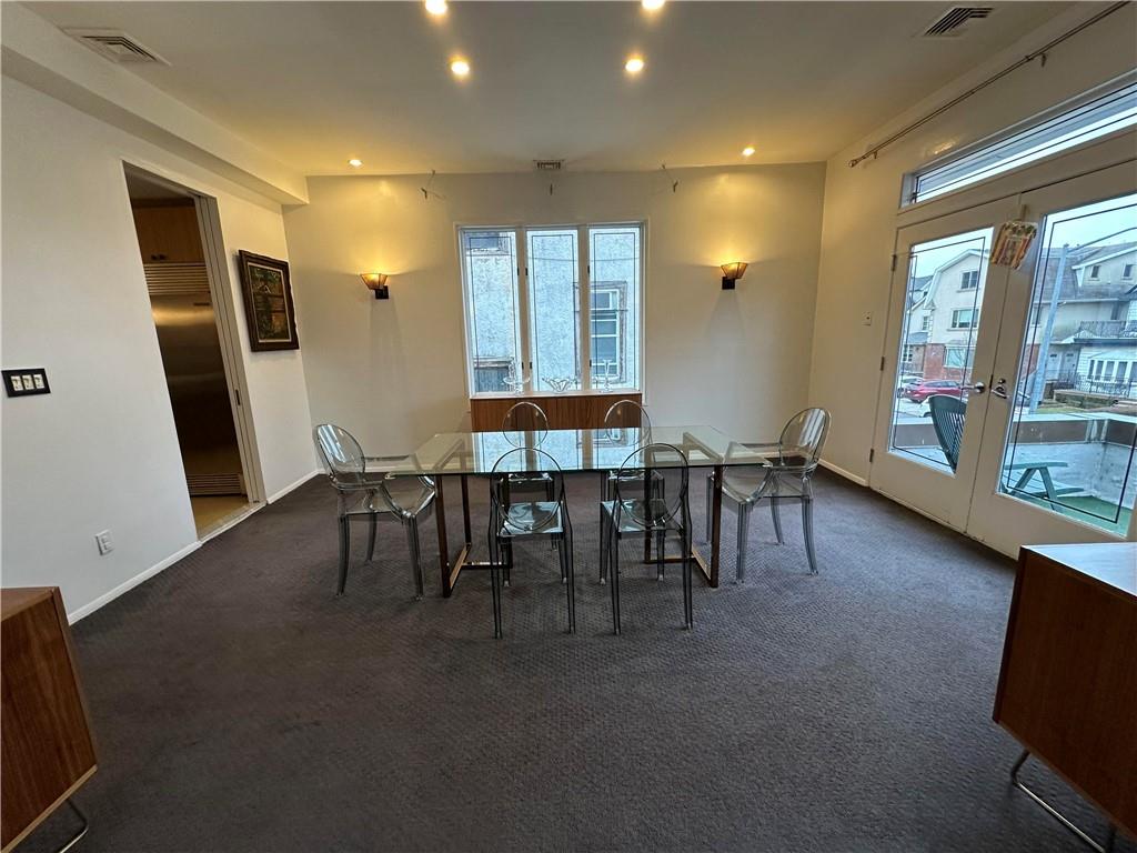 945 East 10th Street Brooklyn, NY 11230 - Photo 11 of 21 a view of a a dining room with furniture window and wooden floor