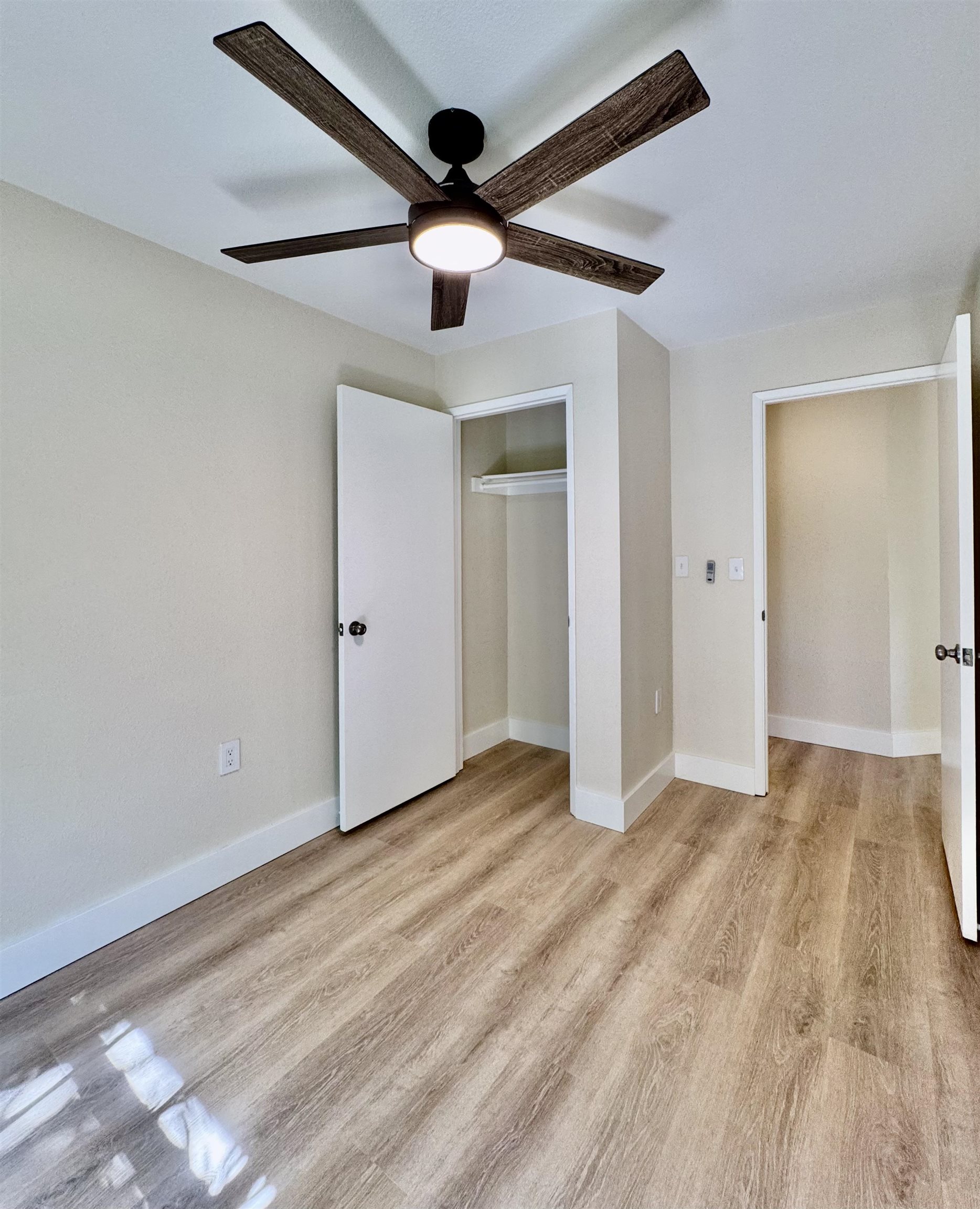 160 Keonekai Road, Unit 13208 Kihei, HI 96753 - Photo 11 of 21 wooden floor in an empty room