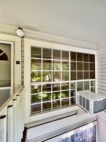a view of a house with a large window