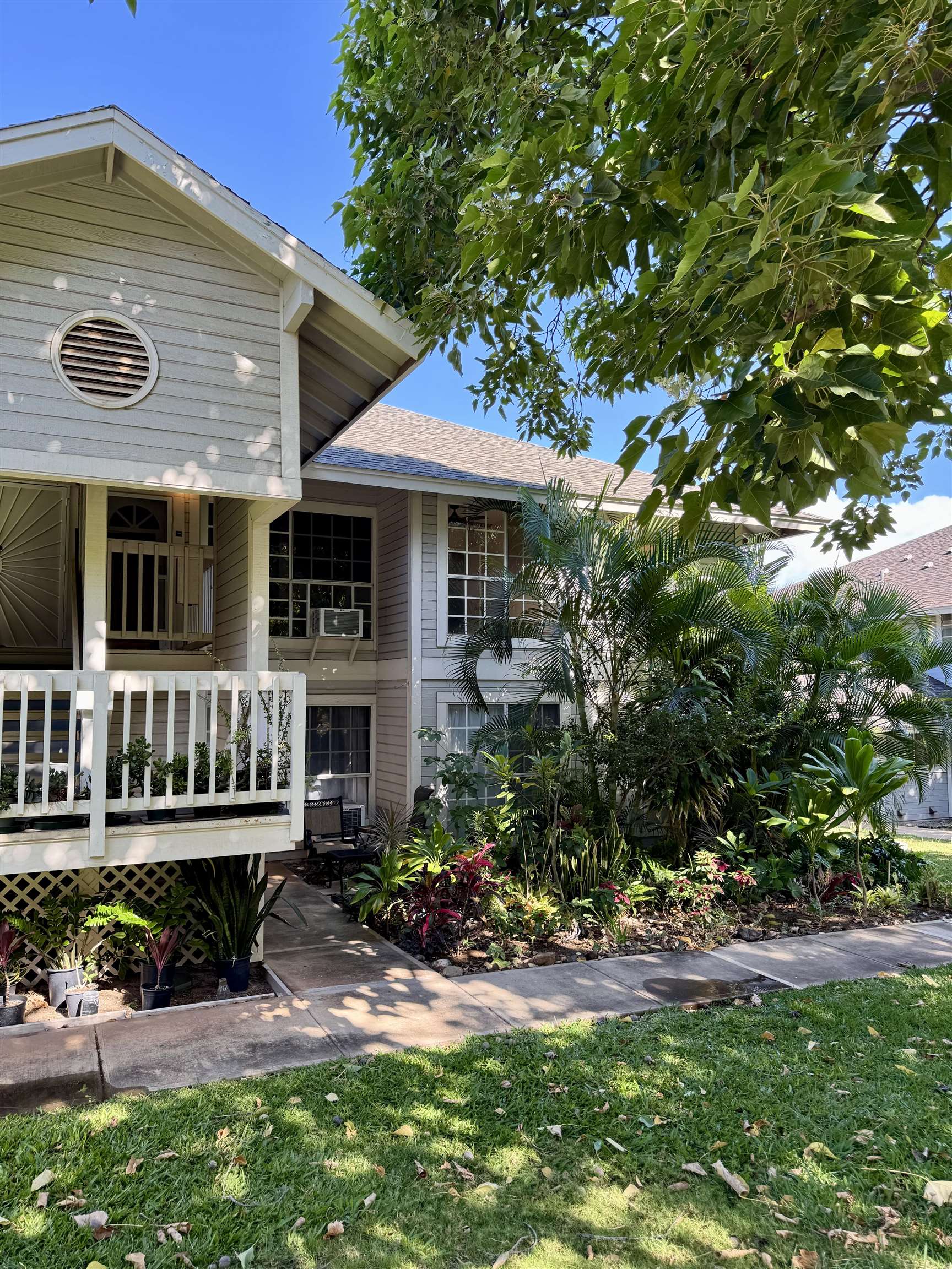 160 Keonekai Road, Unit 13208 Kihei, HI 96753 - Photo 18 of 21 a front view of house with yard outdoor seating and green space