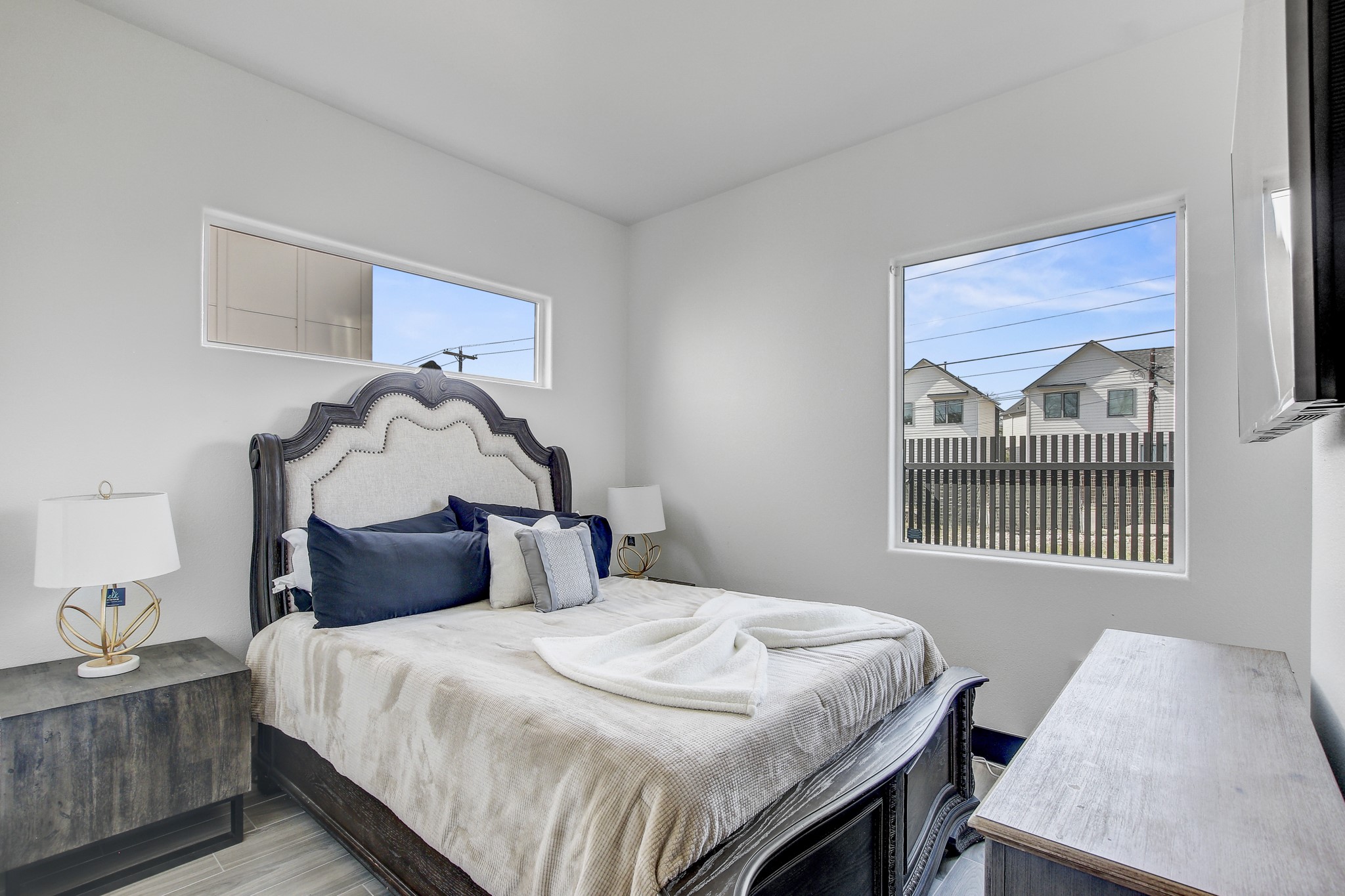 4703 Louis Avenue, Unit A Austin, TX 78721 - Photo 16 of 35 Bedroom with wood finished floors